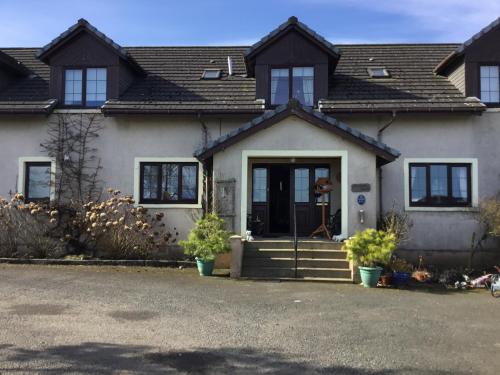 Woodcock Faulds House