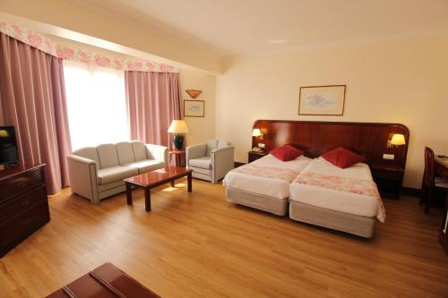 Suite Hotel Jardins d'Ajuda