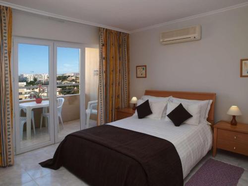 Apartamentos Jardins da Rocha