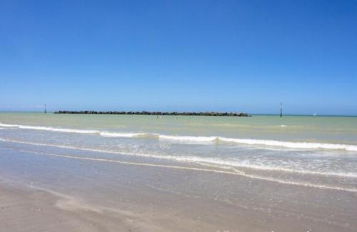 Les pieds dans le sable