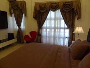 The Executive Villa Inn & Suites
