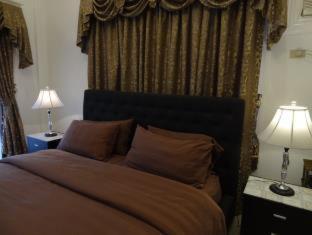 The Executive Villa Inn & Suites