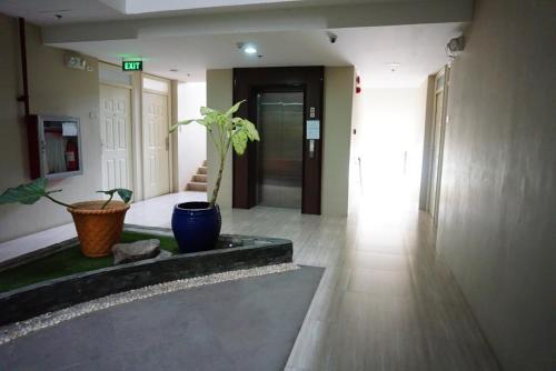 Cozy condo unit 5mins from Mactan Cebu Int'l Airport with Netflix