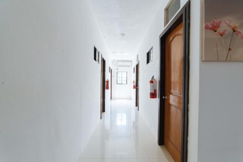 Palmera Garden Hotel by RedDoorz