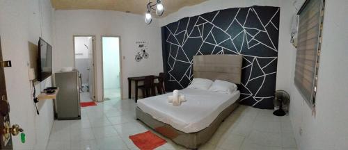 DJCI Apartelle Walk to Robinson & NE Pacific Mall 3 Min to SM Cabanatuan