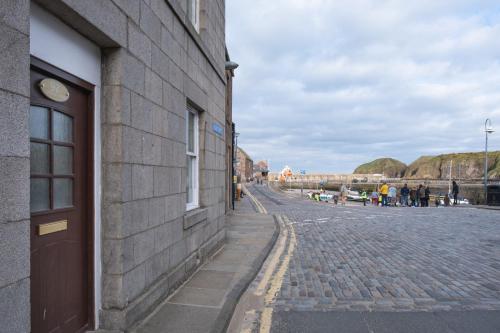 Stonehaven ground floor home with a spectacular harbour view.
