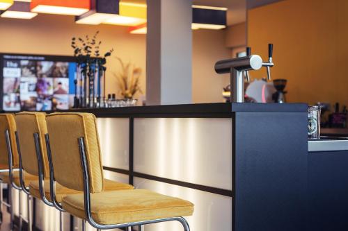 Holiday Inn - the niu, Form Stuttgart Feuerbach