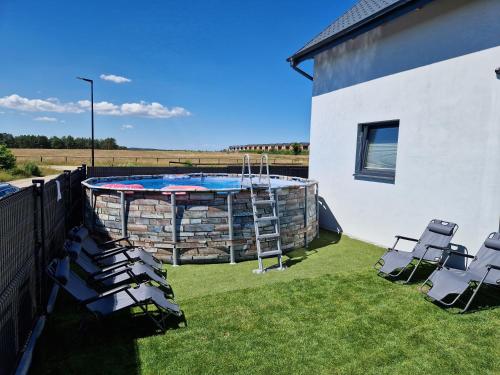 Domki Rajski Wypoczynek z basenem