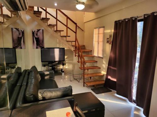 Sheryll Escapes - Kandi Resort-type Spacious 1 BR loft with Netflix and free Housekeeping