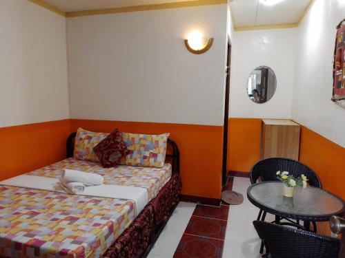 D'Lucky Garden Inn & Suites