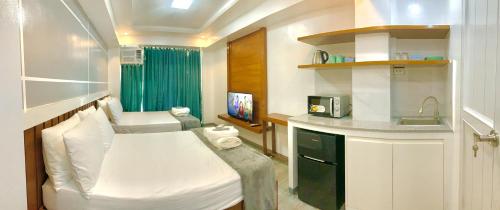 Cozy Unit at the heart of Balanga City
