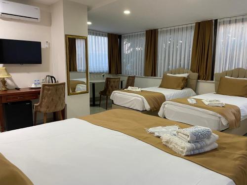 Atam Suites & Apart
