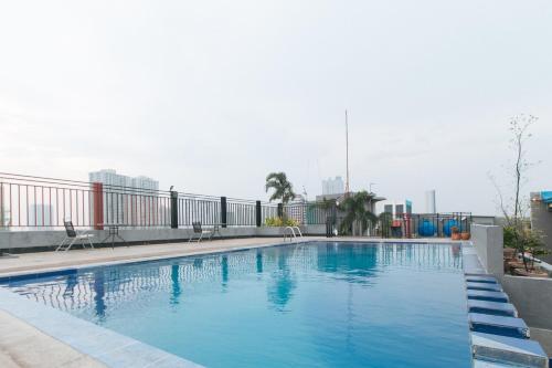 Melbourne Suites Makati by RedDoorz