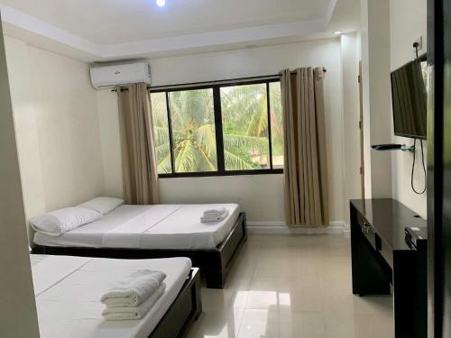 Adelaida Pensionne Hotel y OYO