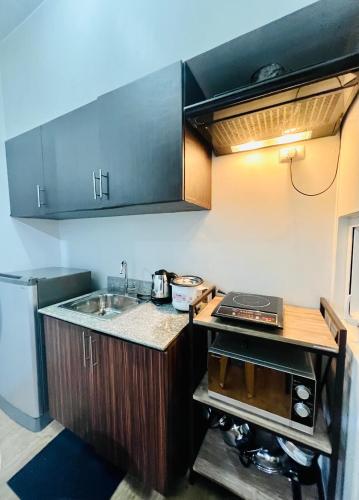 At Home Condo With Free Pool Access