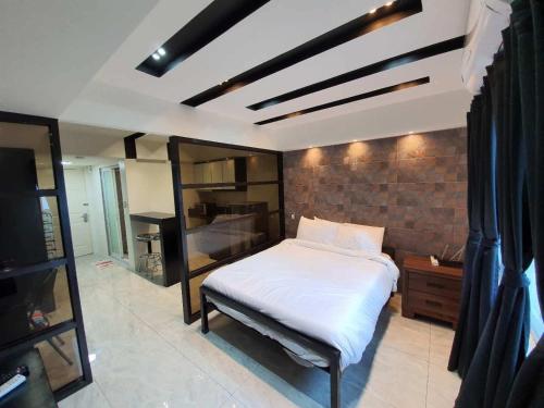 Burgundy McKinley Place Service Apartment