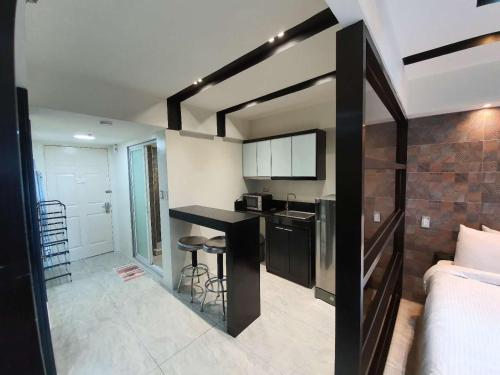 Burgundy McKinley Place Service Apartment