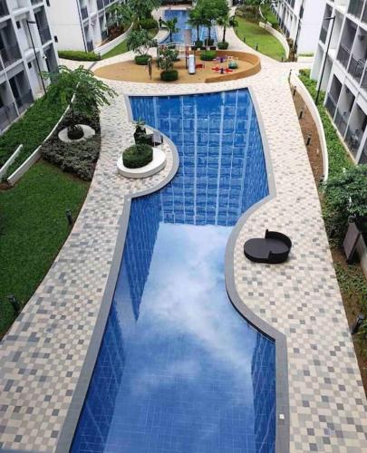 MALL Of ASIA-P00L Fr0nt- NEW 1 BR Condo with Balc0ny at Sh0re2