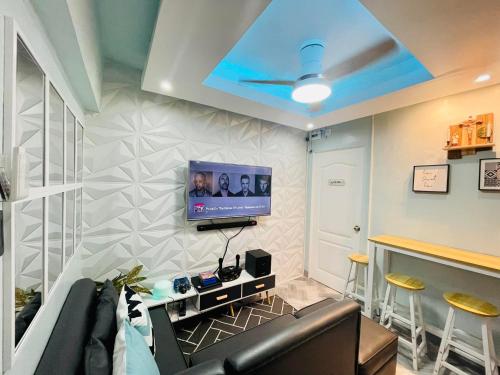 The PAD Staycation 2BR Condo with PS4, Netflix, WIFI