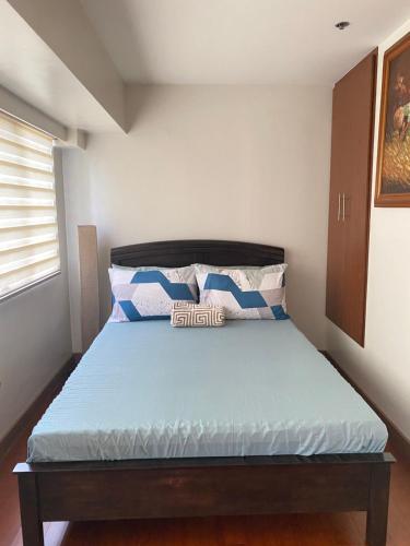 Comfy and Cozy 2BR Condo in BGC with WiFi and Netflix