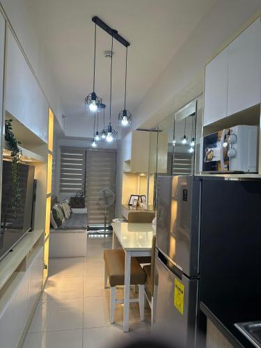 Mel and Rose Place in S Residences Tower 1 MOA