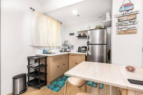 PineSuites Relaxing 2-bedroom condo with pool and garden view accepts small pets only