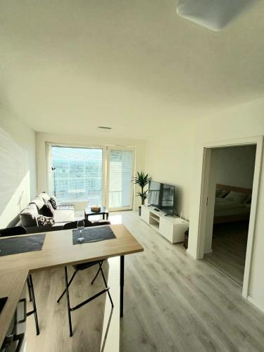 New air-conditioned apartment 5 minutes by walk from the airport with free garage parking
