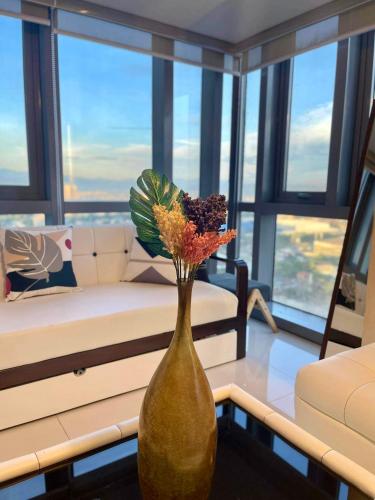 Classy 2BR Suite at Eastwood City with Pool and City Skyline View