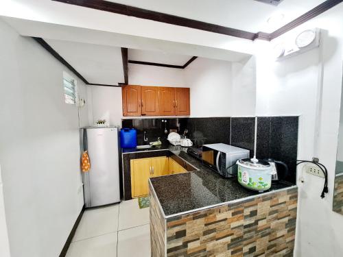 Furnished House in Calapan City Subdivision near ROBINSONS Mall L33