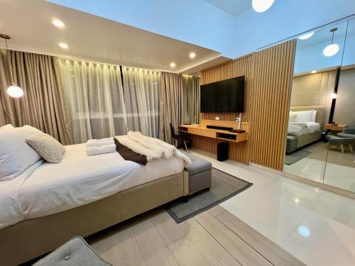 Hotel Vibe Condo at Uptown Parksuites BGC