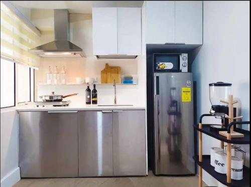 BGC - Two Bedroom Condo with Game Room high speed WiFi