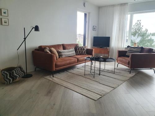 Accogliente appartamento moderno con 1 camera da letto, parcheggio gratuito