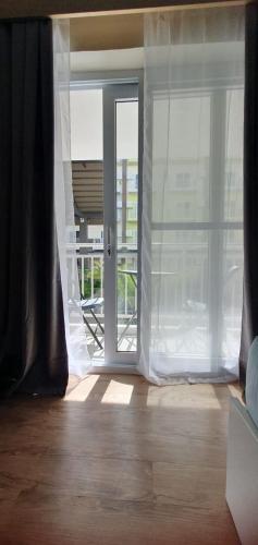 JC SpaceRentals 127B Amani Grand Resort Residences, balcony pool view, Ground floor, 5 mins frm airport, free wifi, Netflix