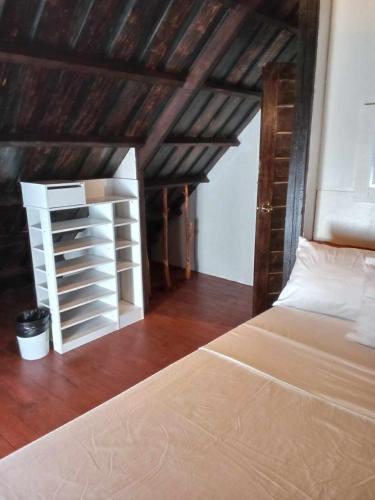 Bayawan Sunset Inn next to julsam and orange house