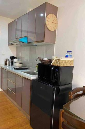 Chic Studio Unit with a Balcony and a View in Megatower Residences 3