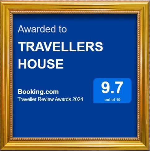 TRAVELLERS HOUSE