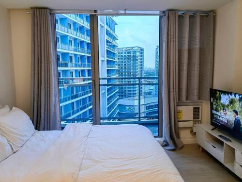 1BR Condotel at Azure Urban Resort Near Airport #AZ03