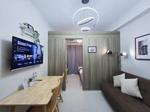 1BR Condotel with Balcony at FAME Residences #FM31