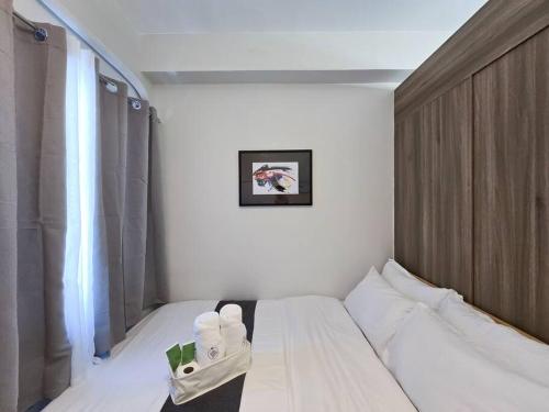 1BR Condotel with Balcony at FAME Residences #FM31