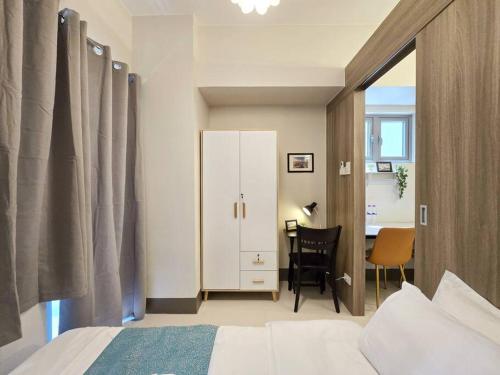 1BR Condotel with Balcony at FAME Residences #FM35
