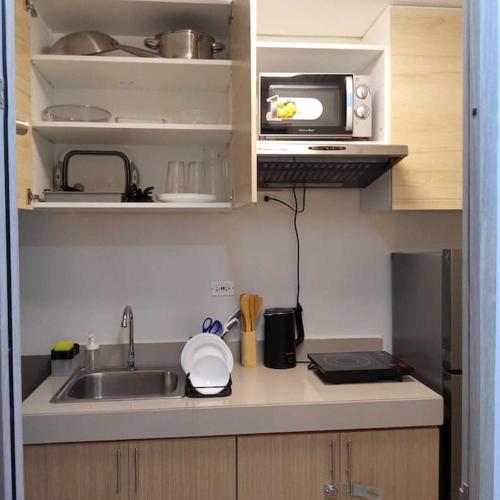 1014 - Cavite Minimalist Condo with Resort-like Amenities & Hi Speed Wifi