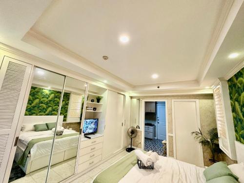 One Bedroom with Balcony by Christine Suites PH in Greenbelt Radisson