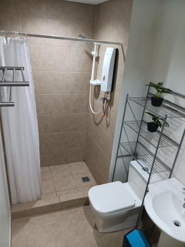 CB Homestay 2BR Unit Taguig Self-Check-In & Wi-Fi