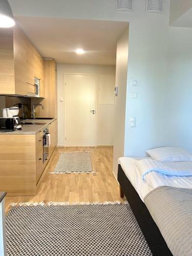 Kotimaailma Apartments - Madetojanaukio