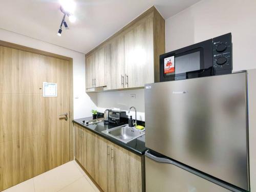 1BR Condotel with Balcony at FAME Residences #FM03