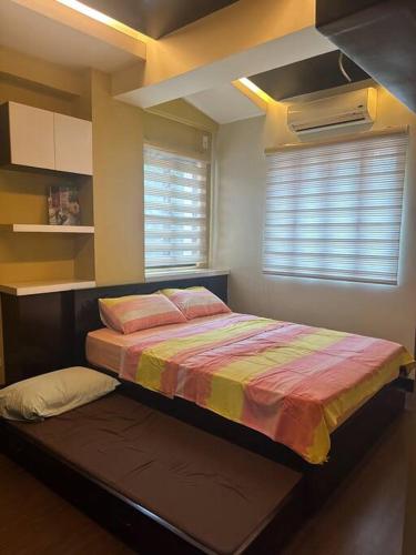 1-Bedroom condo with pool across NAIA Terminal 3