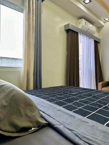 SMDC CHARM 1 bedroom condo with Netflix & Balcony