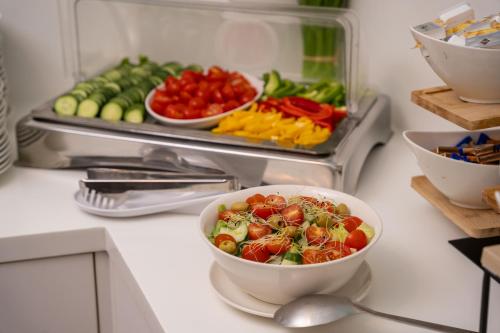 Escala Hotel & Suites