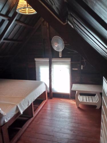 Bayawan Sunset Inn next to julsam and orange house