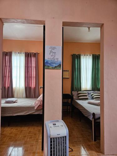 Mel's Place Batangas Unit 1 Two-Bedroom House w Free Parking Free Wifi 4 adults and kids